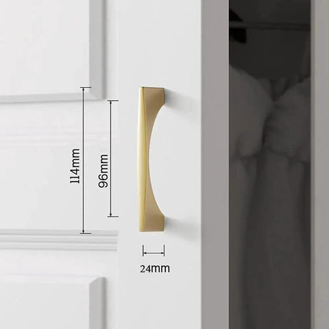 Installed view of 4 Pack Brushed Gold Cabinet Drawer Pulls in zinc alloy with brushed brass finish, 96mm hole pitch on white cabinet