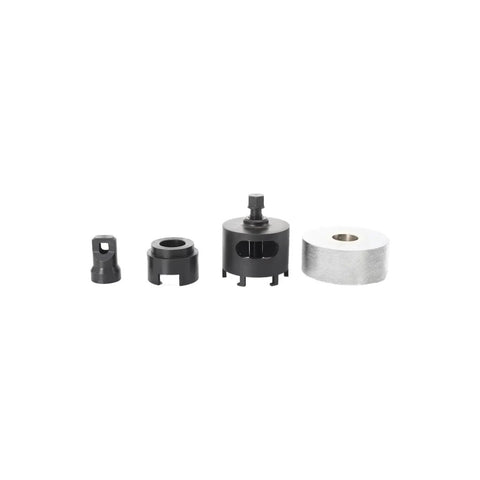 Engine timing tool set front view: four black metal components and a roll of white tape