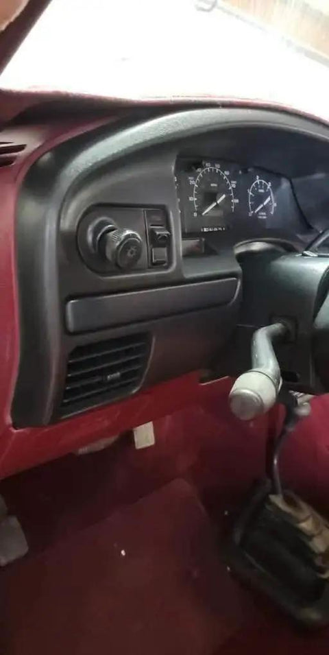 Ford Bronco And F Series Dash Panel Bezel Replacement 1992 1997 Gas Engine installed view showing steering column and dashboard controls.