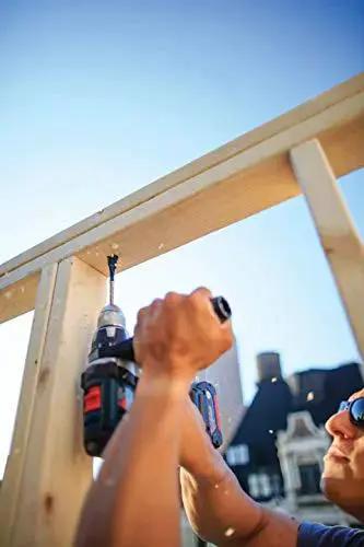 Person using a drill with Daredevil Standard Spade Bit 1 Inch By 6 Inch For Quick Drilling And Clean Holes on a wooden frame