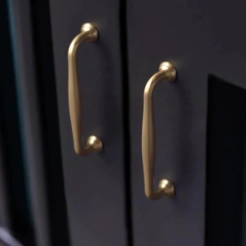 Installed Six Pack 5 Inch Center To Center Modern Champagne Bronze Cabinet Pulls on dark cabinet doors