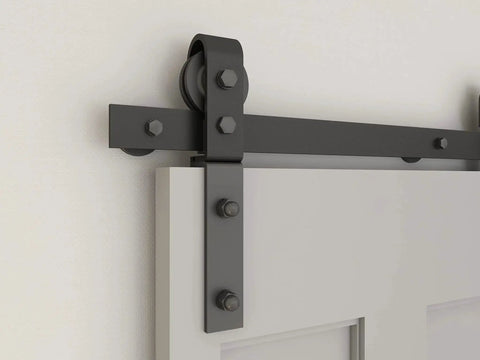 Close-up view of 43 Inch Bi Folding Sliding Barn Door Hardware Kit with side mounted bifold system and two rollers.
