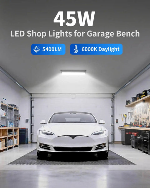 IP66 Waterproof 45W LED Shop Light With 5400 Lumens At 6000K Daylight White 6 Foot Power Cord And Built In Switch Plug In Work Light For Garage Workshop Warehouse Basement Or Yard Energy Saving Up To 80 Percent 2 Pack THECHAM illuminating a garage with parked car