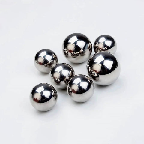 5.556mm Steel Balls Solid Carbon Steel Balls 50pcs Hunting Ball Bearing Ball clustered on white surface