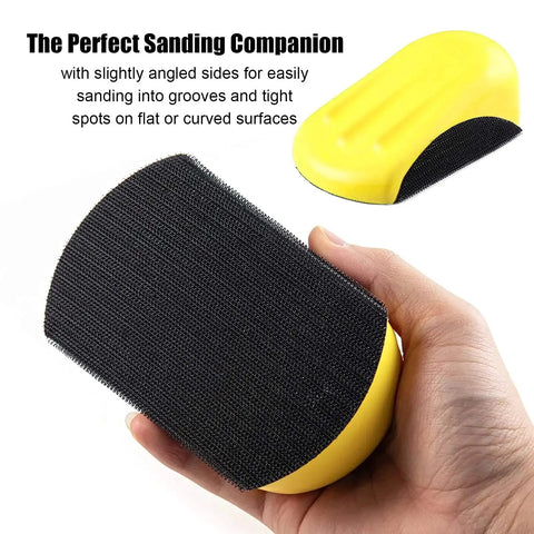 Close-up of a hand holding a yellow 5 Inch Hook And Loop Mouse Sanding Block, showing the hook-and-loop pad for woodworking and furniture.