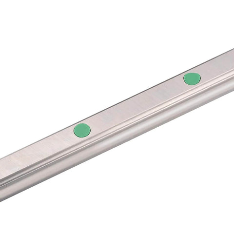 Close-up view of 500mm HGR20 linear guide rail segment showing the metal structure with green components for alignment, part of CNC precision tools.