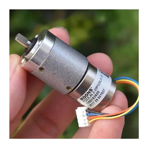 12V DC Full Metal Planetary Gearbox Reducer For Stepper Motors Heavy Duty Gear Reduction Unit in hand, showing wiring connectors
