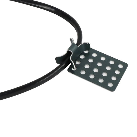 Heat cable roof clip with dark gray perforated metal plate securing outdoor deicing cable