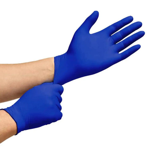 Person wearing Cobalt Blue Nitrile Examination Gloves Latex Free Medical Grade 4.5 Mil showing fit and dexterity.