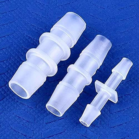 JoyTube plastic 1/8 inch hose barb connectors set, translucent white plastic, four pieces shown for water/air tubing.