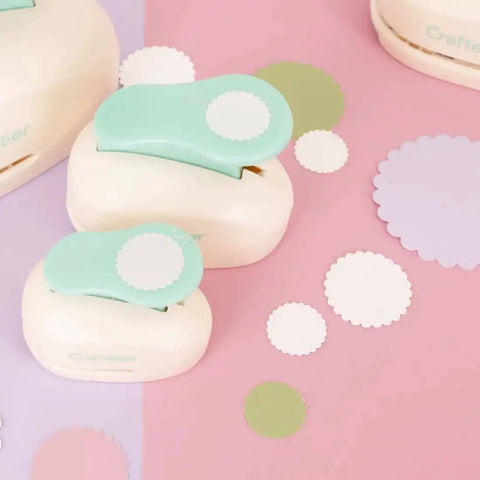 3 Inch Circle Scallop Punch with Easy Lever Press for scrapbooking, DIY cards and journals, shown with cutouts and punch tools on desk