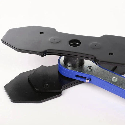 Brake caliper press tool with blue handle and black plates for automotive brake repair (side view)