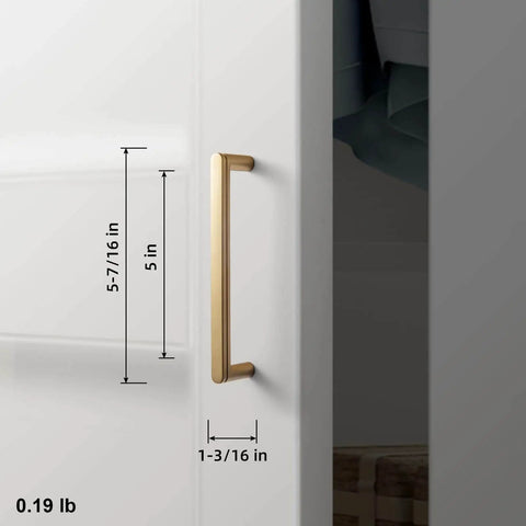 5 Inch Champagne Bronze Cabinet Pull Handles 6 Pack With Grooved Texture And Non Slip Grip installed on white cabinet door.