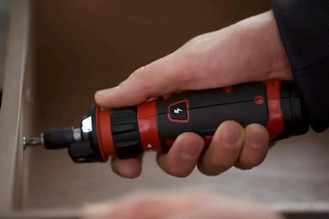 Using Rechargeable 4V Cordless Screwdriver With Circuit Sensor Technology for safe electrical work, includes 9 bits, compact for fixes.