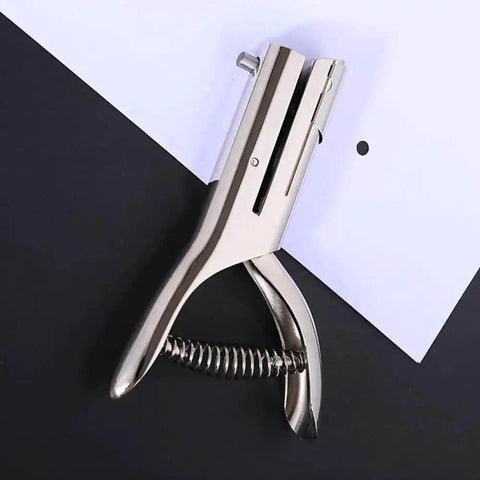 One Hole Metal Punch Tool For Crafts On The Go Circle Slot Handheld Punch in use on paper, showing 3mm hole size, chrome-plated zinc