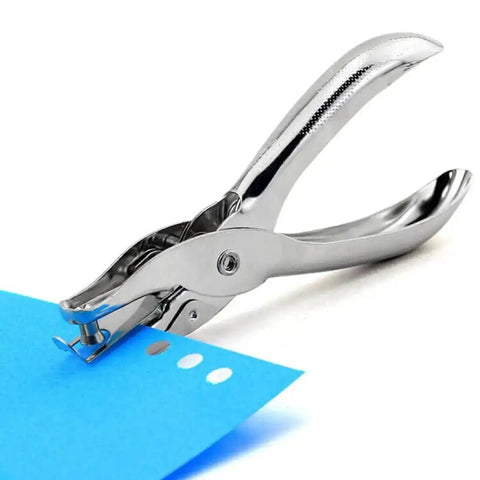 Compact Single Hole Punch Metal Circle Punch For Scrapbooking And Office Use 6mm Hole Puncher in use, punching through blue paper.
