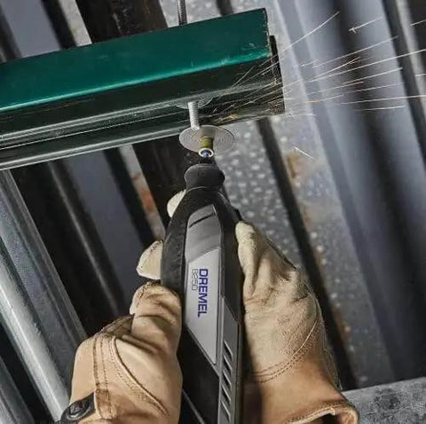 Powerful 12V Cordless Rotary Tool With Brushless Motor From Dremel in use cutting metal with sparks flying