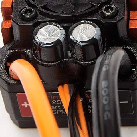 Close-up of the 85A Brushless Smart ESC And 4000Kv Sensorless Motor Combo For RC Cars And Trucks, showing wiring and connectors.