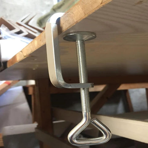 Kyien stainless steel C-clamp securing a wooden edge; long threaded screw and triangular handle.