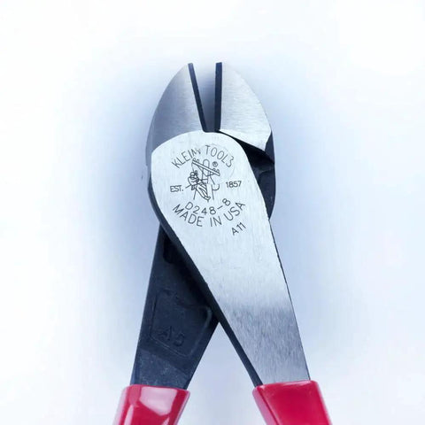 Angled-Head Diagonal Cutting Pliers For Tight Spaces With High-Leverage And Short Jaw 8-Inch Multi-Purpose Wire Cutters Made In USA Klein Tools For Pros And DIYers Who Need Precise, Clean Cuts In Tight Spots. Close-up of red-handled cutting jaws.
