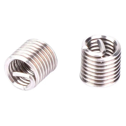 Close-up of stainless steel threaded inserts from Thread Repair Kit M4x0.7 Stainless Steel Twisted Drill Wrench Threaded Inserts Set For Metric Imperial Hole Conversion And Quick Thread Repair Pro Grade Durable Auto Machinery And Metal Projects.