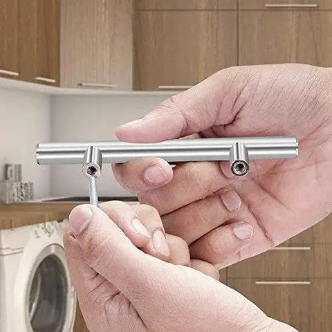 Hand holding Stainless Steel Hollow Tube T Bar Cabinet Handle Pack Of 30 Brushed Nickel Finish 150mm Overall Length