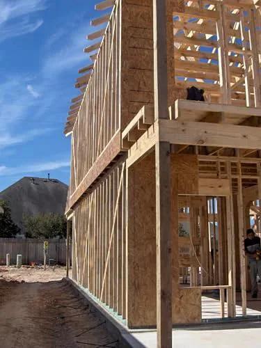 Wood frame construction with roof trusses, suitable for Hurricane Tie H2.5A 18 Gauge Galvanized Structural Tie installation.