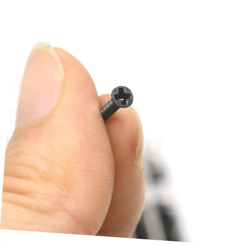 Close-up of a single countersunk round screw from the Two Piece Miniature Screw Set With Countersunk Round Screws, DIY Friendly for glasses
