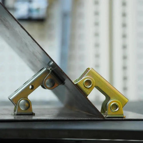 Magnetic V Pad Kit For Light Duty Holding And Positioning, 4-Piece Set shown with metal parts in use