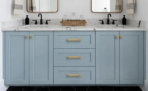 Gold Cabinet Knobs Set 10 Pack Round 1 Inch Brushed Brass Zinc Alloy on blue bathroom vanity