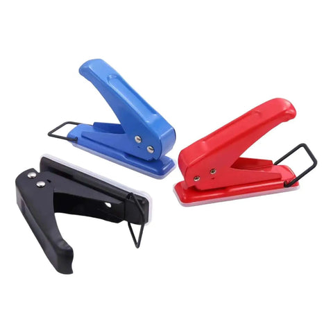 Black, blue, and red ergonomic grip Go-To One Quarter Inch Single Hole Punchers with 20-sheet capacity for office and crafts.
