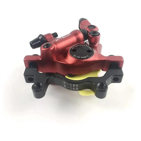 Bucklos Zoom HB-100 MTB hydraulic disc brake caliper, red aluminum alloy with black mounting bracket for front or rear use