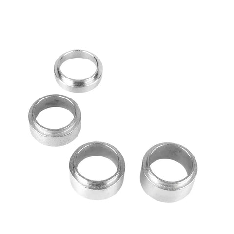 Five silver metal spacer rings for automotive crank/camshaft tool set with hollow centers