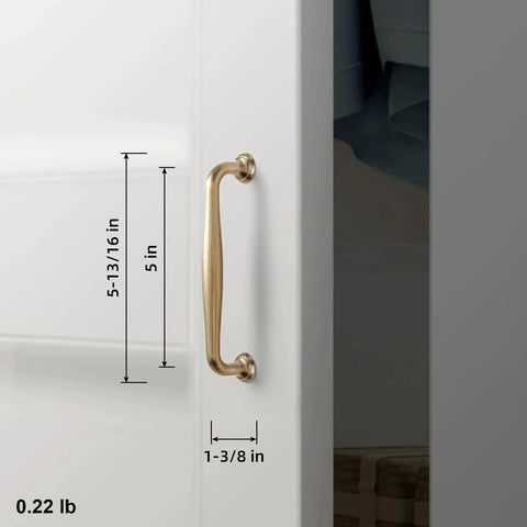 Side view of Six Pack 5 Inch Center To Center Modern Champagne Bronze Cabinet Pulls with sleek tapered handles on a white cabinet.