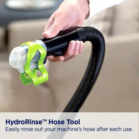 Close-up of HydroRinse Hose Tool for Portable Deep Carpet Cleaner For Home And Auto Use With 48oz Tank Stain Brush BISSELL.
