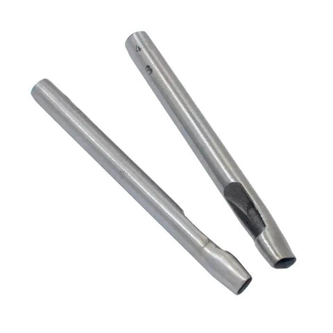 Close-up of two carbon steel punches from Six Size Leather Oval Hole Punch Set With Carbon Steel Punches For Belts Straps Gaskets And Other Soft Materials Easy Hammer Installation Creates Clean Oval Holes For Leather Crafting.