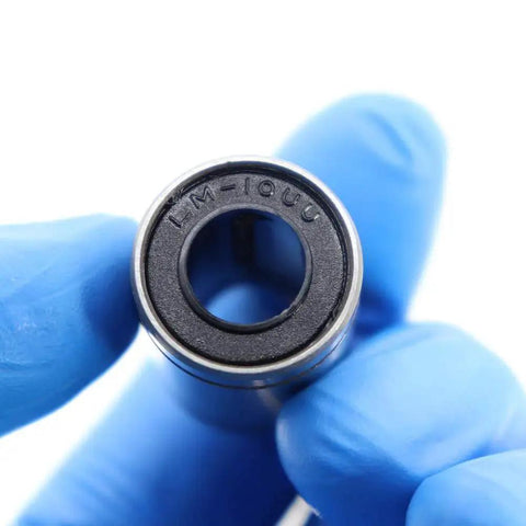 Person holding LM10UU bearing from 3D Printer Linear Bearing Set For JGAurora A5 A5S A1 A3S LM10UU Bearings 10x19x29mm Pack Of 4