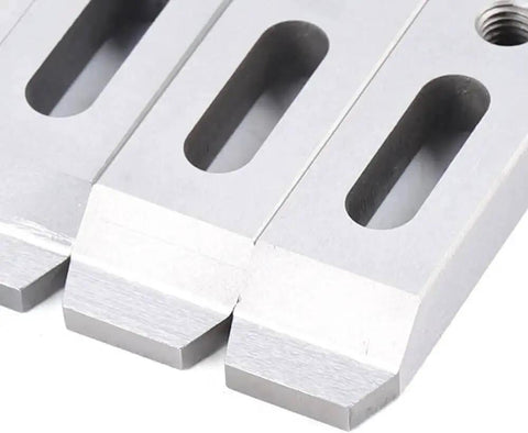 Close-up of Pro Grade Stainless Wire EDM Jig Holder Set, 4-Piece Fixture Board Fixturing Tool with M8x1.25 Screws, stainless steel construction.