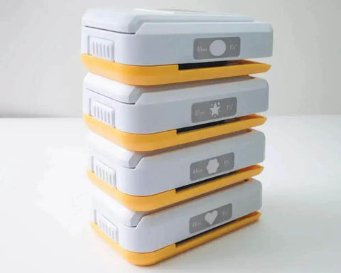 Stacked SlimLock Large Oval Punch 40mm By 30mm for scrapbooking, card making, with upside-down alignment and compact storage design.