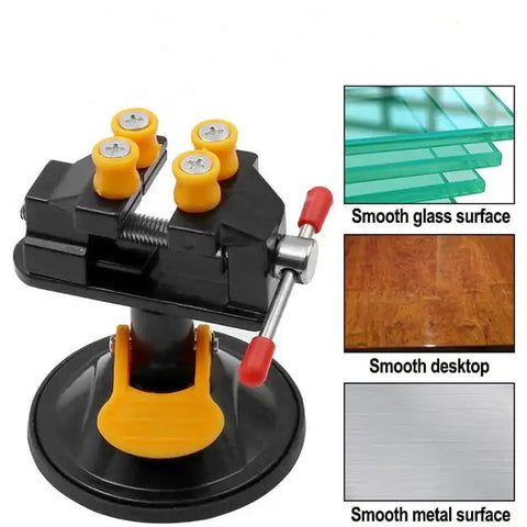 Mini Table Vise With Suction Base, 360 Degree Rotating Clamp, 0 to 25mm Jaw, shown with smooth glass surface and desktop