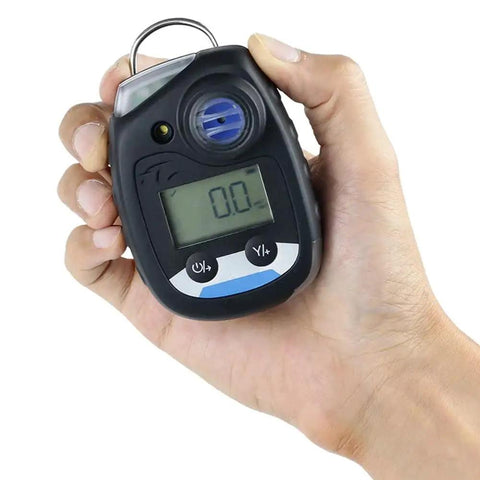 Portable Oxygen O2 Gas Detector with sound, light, and vibration alarm, back clip, easy to use, in hand, front view, low power consumption