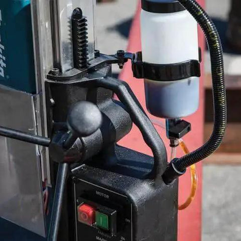 Close-up of Portable Magnetic Drill For Steel With One And Three Eighths Inch Capacity And Two Inch Thick Cutting, featuring spindle coolant