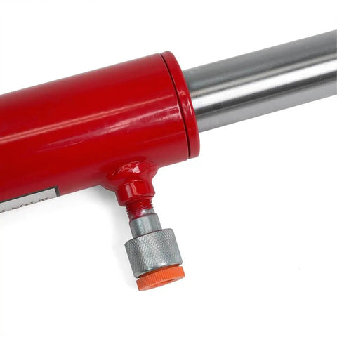 Close-up of a 26 Inch Long 10 Ton Hydraulic Pull Back Ram for Porta Power Frame Machine, showing red and metal components with valve.