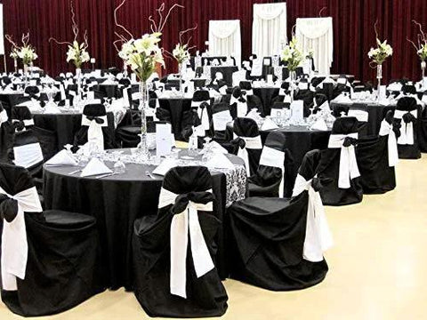 Elegant banquet hall with black covers and 10 Piece Satin Chair Sashes Bows For Wedding Reception And Banquet Decor Universal Back Tie For Chairs