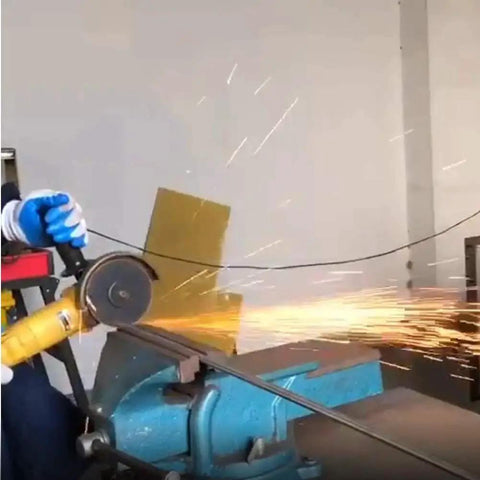 Person using Ultra Thin 4.5 Inch Cut Off Wheels 100 Pack For Angle Grinders 4-1/2 Inch.047 Thick 7/8 Inch Arbor Discs to cut metal.