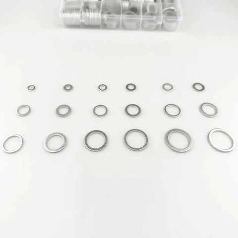 570 Piece Oil Drain Plug Gasket And Crush Washer Kit With 18 Sizes M6 Through M24 Aluminum Flat Washers in rows on a table