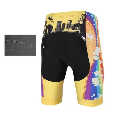 Colorful cycling shorts with city skyline and abstract rainbow design, featuring close-up of black padded seat stitching.