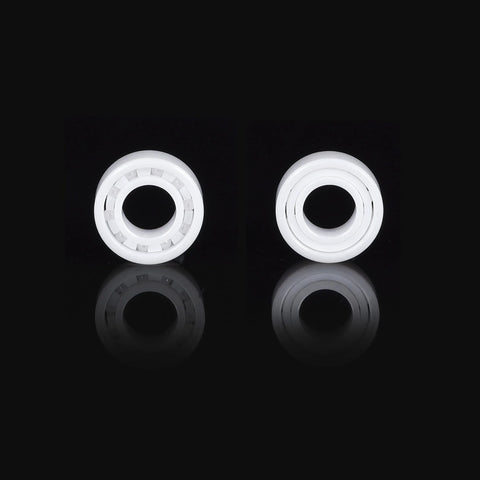 Two white R188 full ceramic bearings, zirconia (ZrO2), 1/4 x 1/2 x 3/16 in, deep‑groove miniature bearings