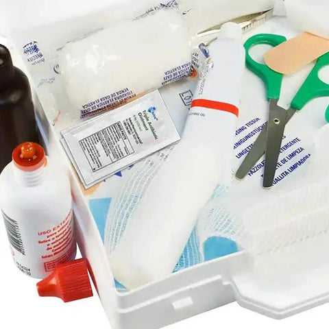 Top view of first aid kit contents including scissors, bandages, ointments, and Travel Size Triple Antibiotic Ointment Pack For Minor Scratches And Burns 0.9g Singles 144 Pack First Aid Kit Essentials Protects Against Infection With Neomycin Bacitracin Polymyxin Compare To Leading Brand Ideal For Home On The Go.
