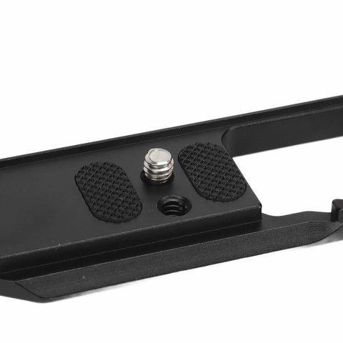 Close-up of bottom view of Wood Handle Metal Camera Cage for ZFC With Vertical Rig Design Cold Shoe Mount And Multiple One Quarter Inch And Three Eighths Inch Screw Holes For Attaching Top Handles Monitors And Tripods.